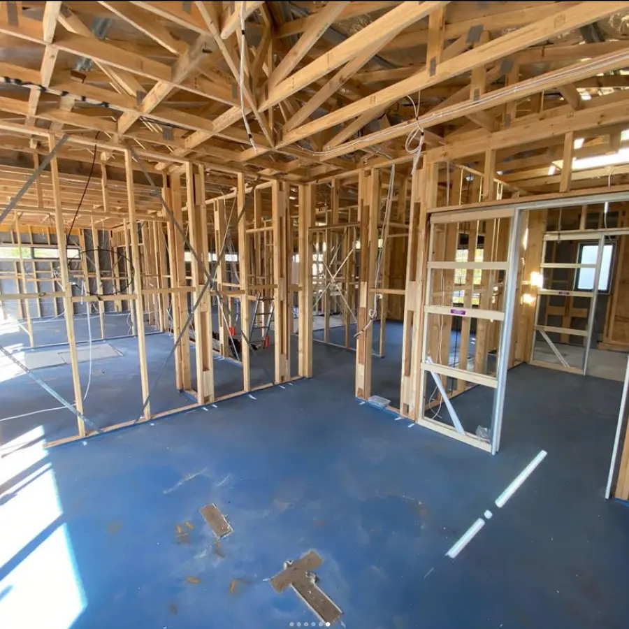 Timber wall and roof framing through a new home extension