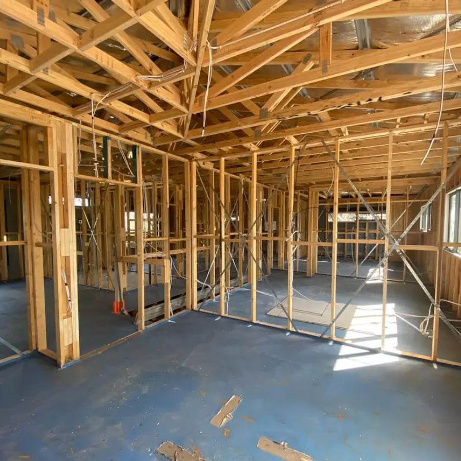 Timber roof and wall framing inside a home under construction