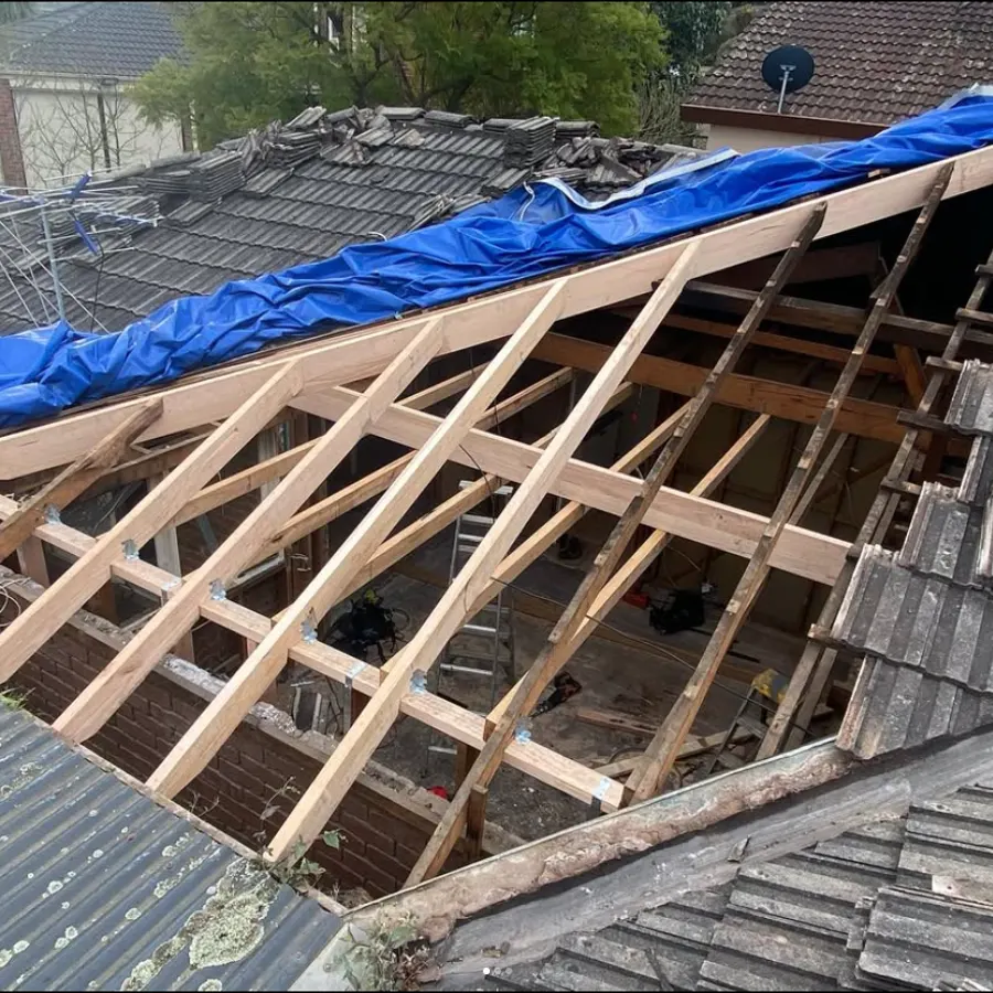 Roof edge stripped back and rebuilt with new hand-pitched framing