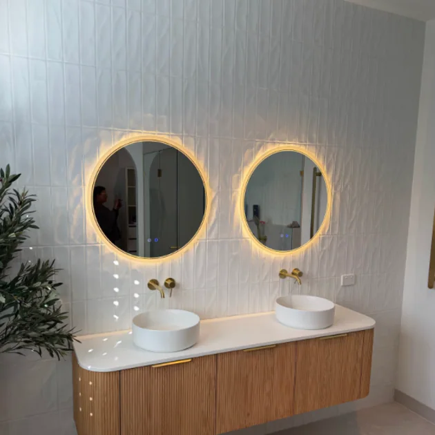 Timber vanity in a completed bathroom renovation